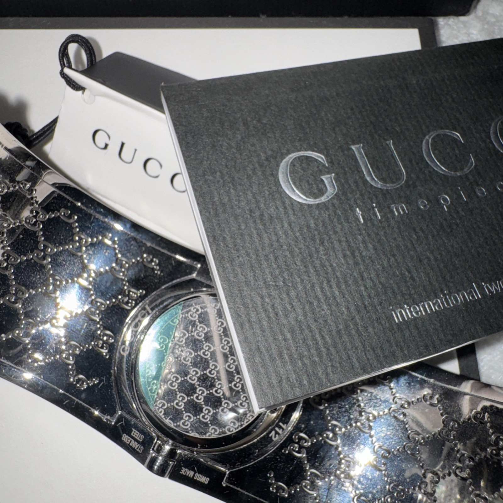 Gucci Twirl GG Brown Dial Silver Bangle Watch YA112401