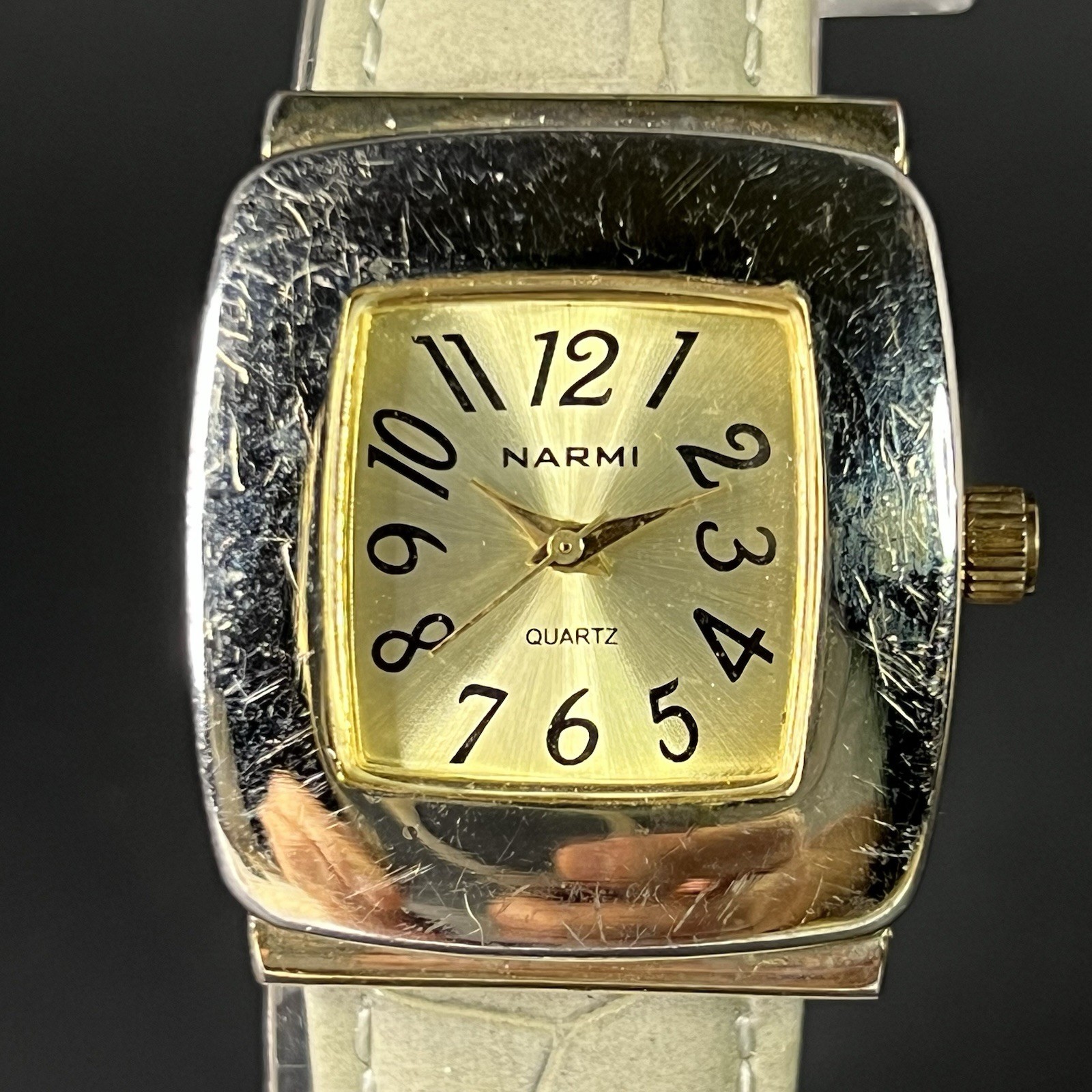 Narmi Women’s 28mm Square Silver Case Polished Bezel Gold Dial White Strap