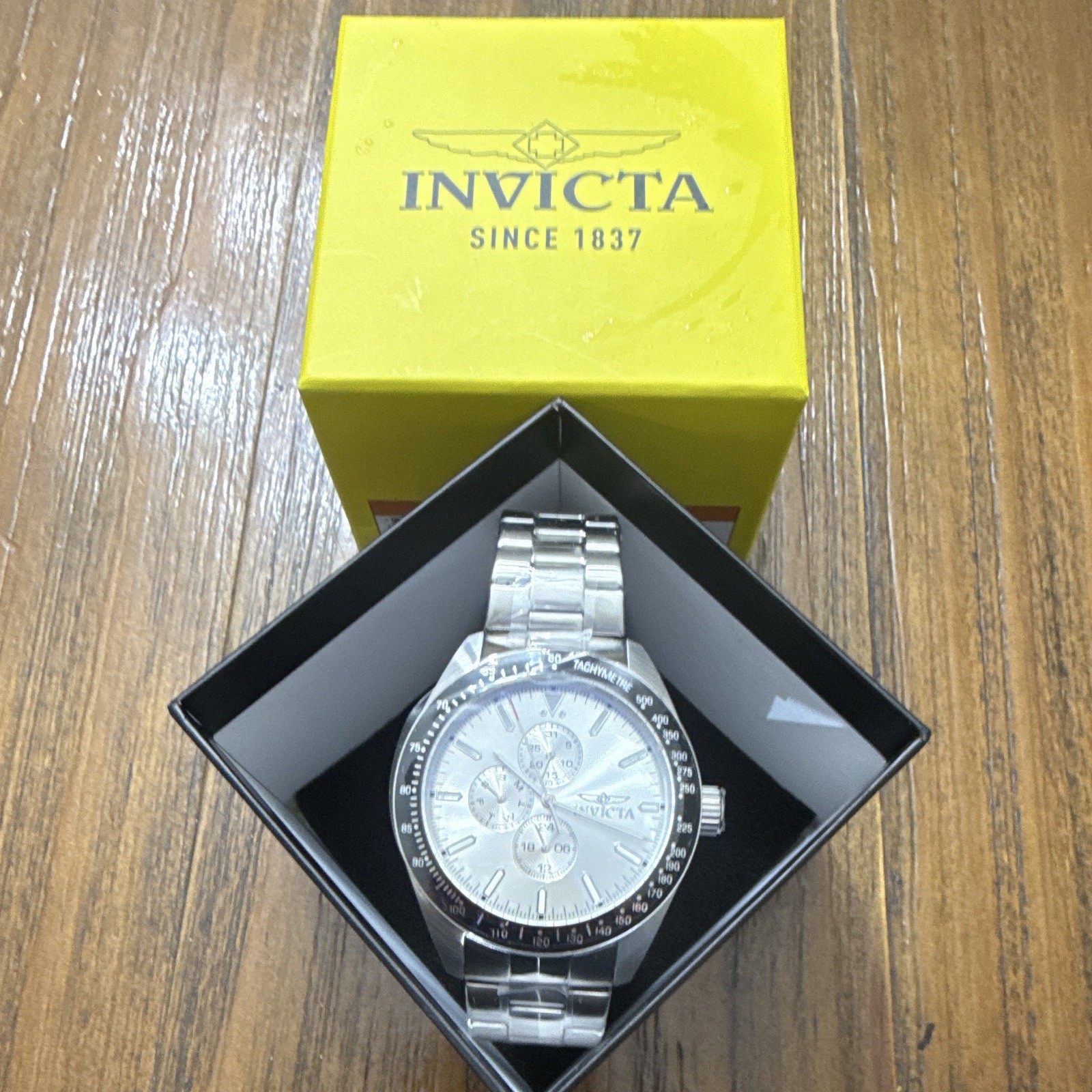 Invicta Men’s Chronograph Tachymeter Quartz Silver Dial SS Bracelet w/ Box