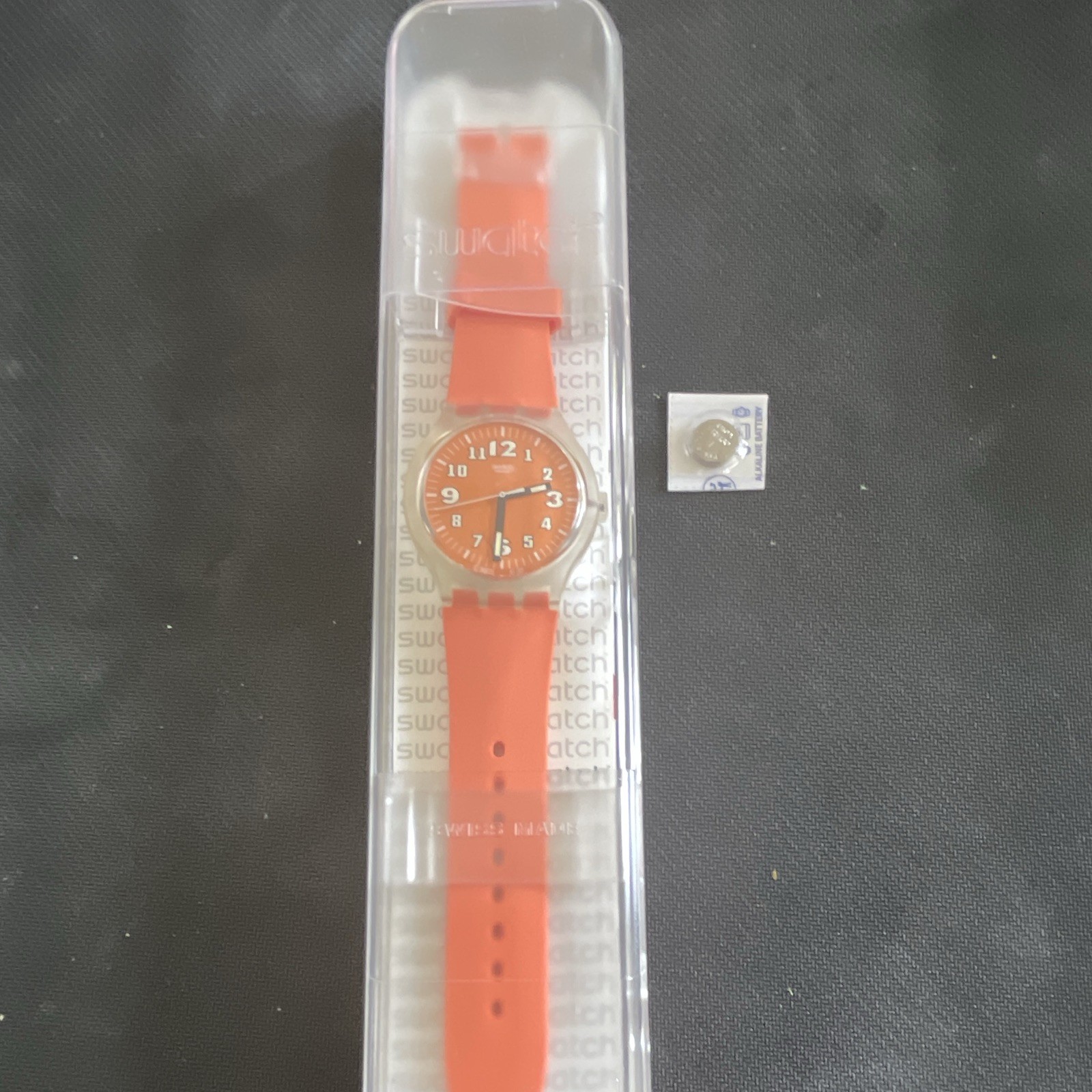 Swatch Gent Quartz Analog 34mm Orange Dial Clear Case Orange Strap Box