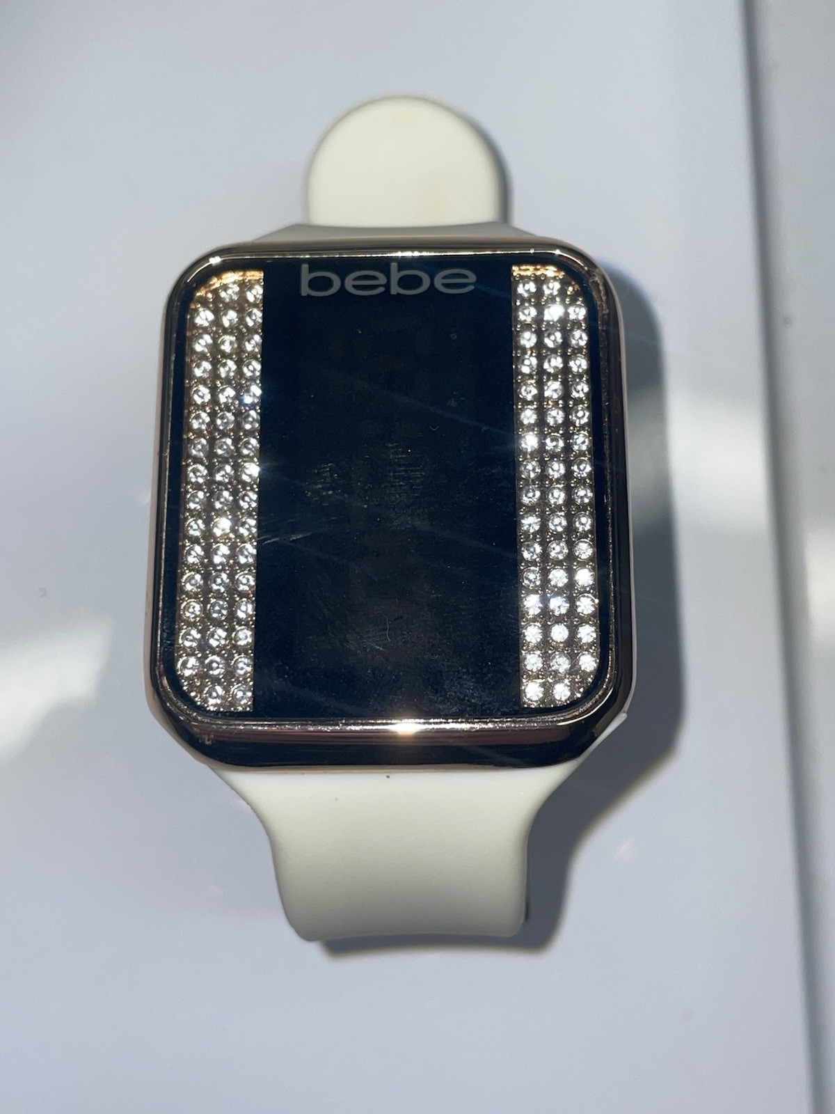 bebe Women’s Rectangular Wristwatch White Band Gemstone Markers Gold Case