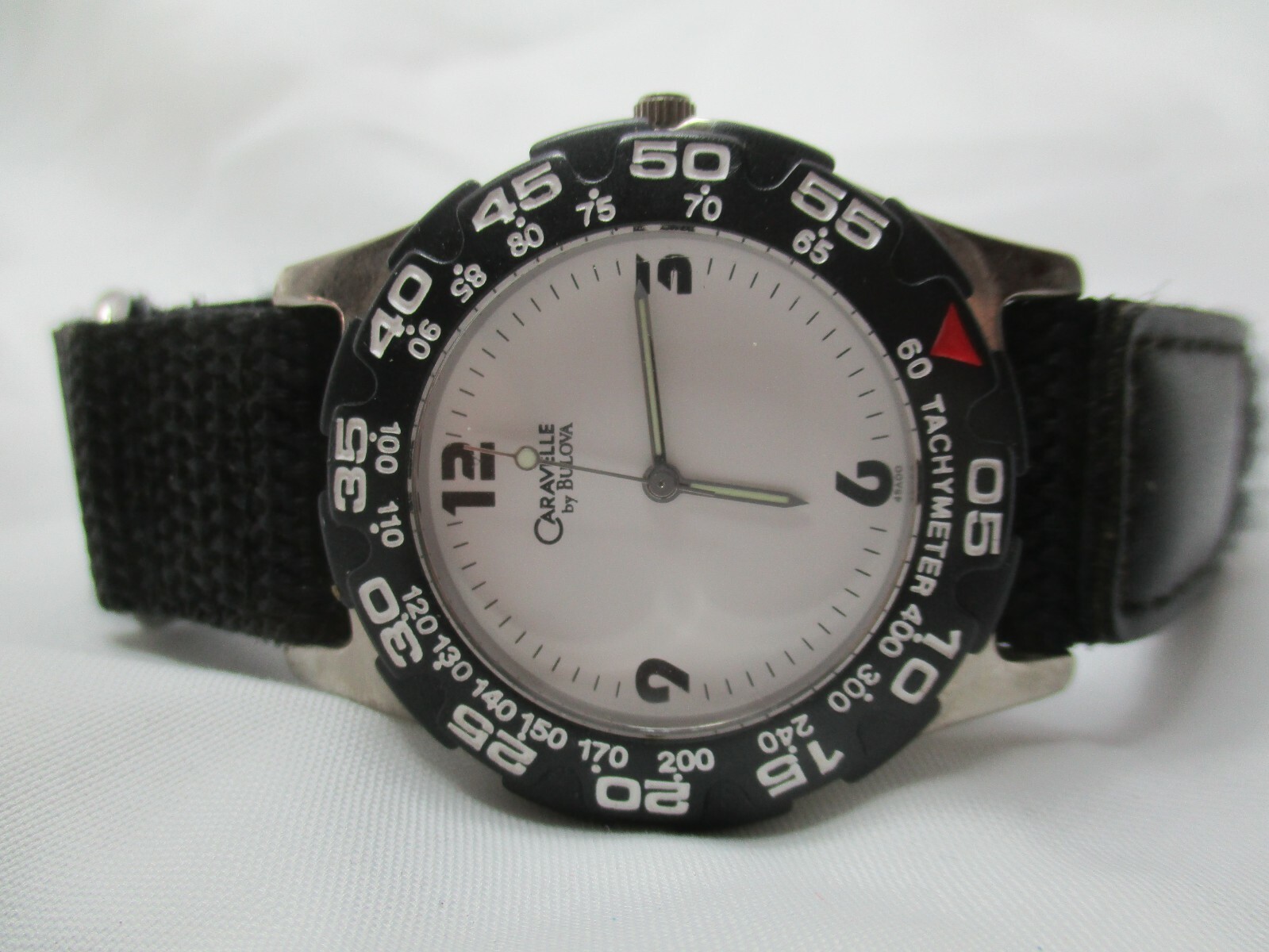 Caravelle by Bulova Analog Watch Black Hook & Loop Band Round White Face