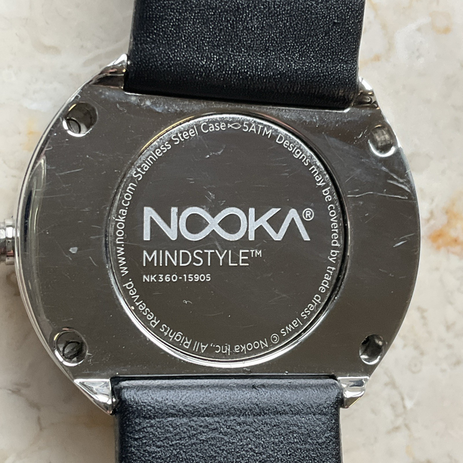 NOOKA NK 360 degree rotating face Black Watch with case needs battery UNTESTED