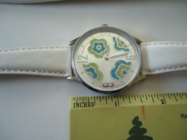 Avon Women’s Watch White Floral 1.5” Face Needs battery & strap replacement