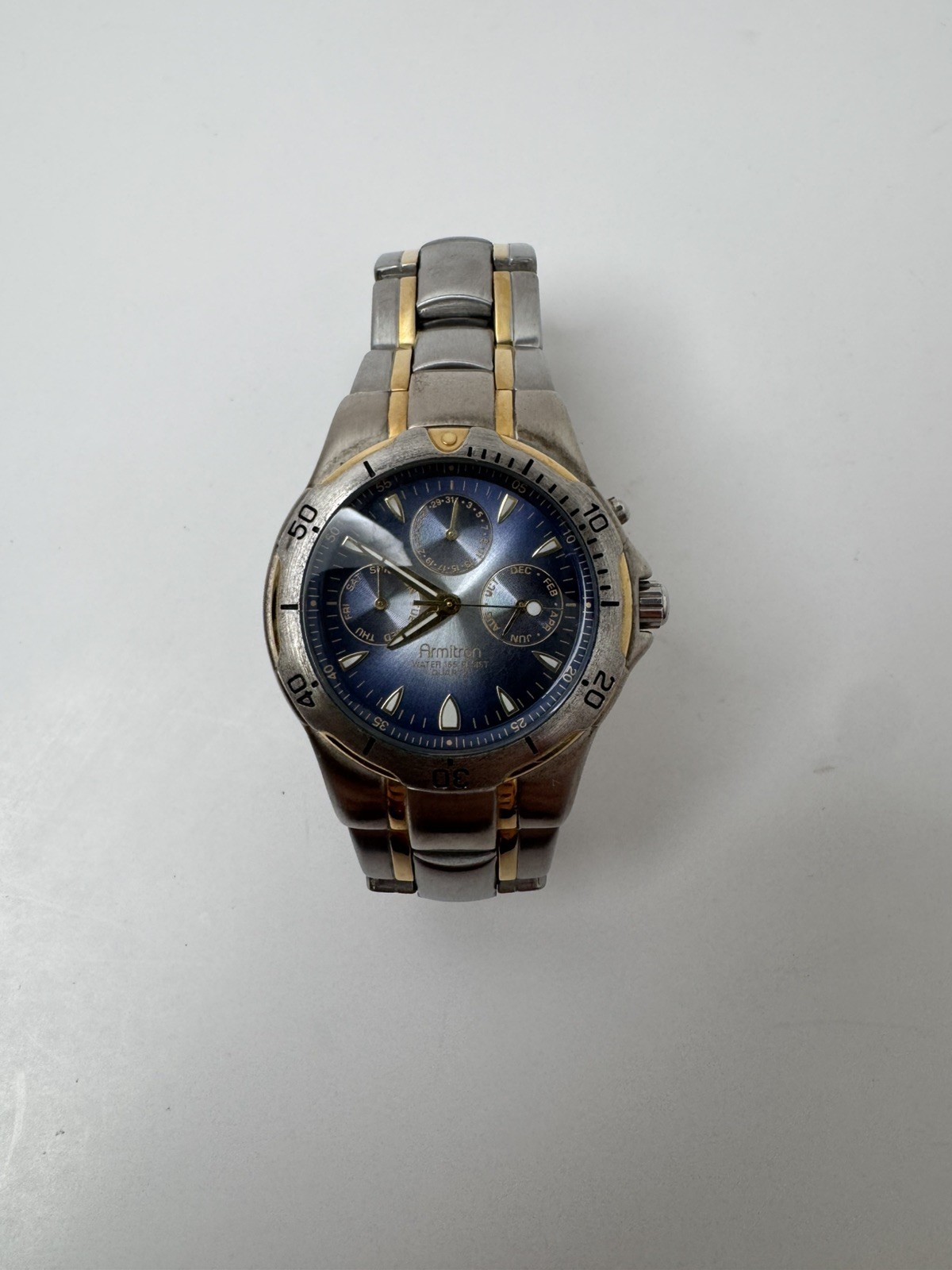 Armitron Men Watch Stainless Silver Gold Month Day Date 50m Battery Blue Quartz