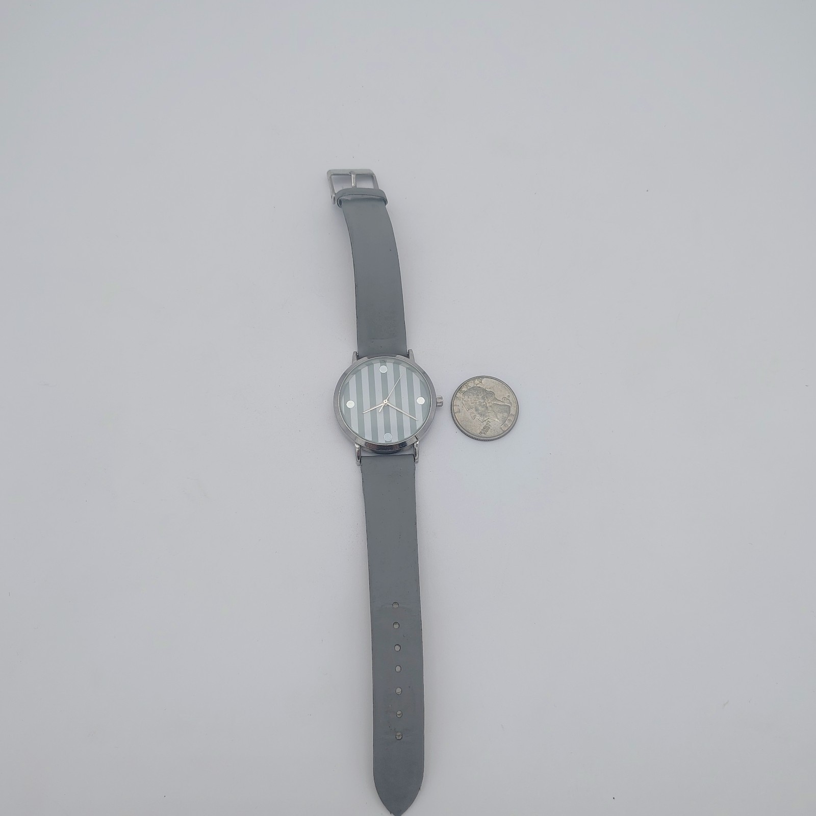 Silvertone Bezel Gray And White Striped Dial Gray Band NEW BATTERY