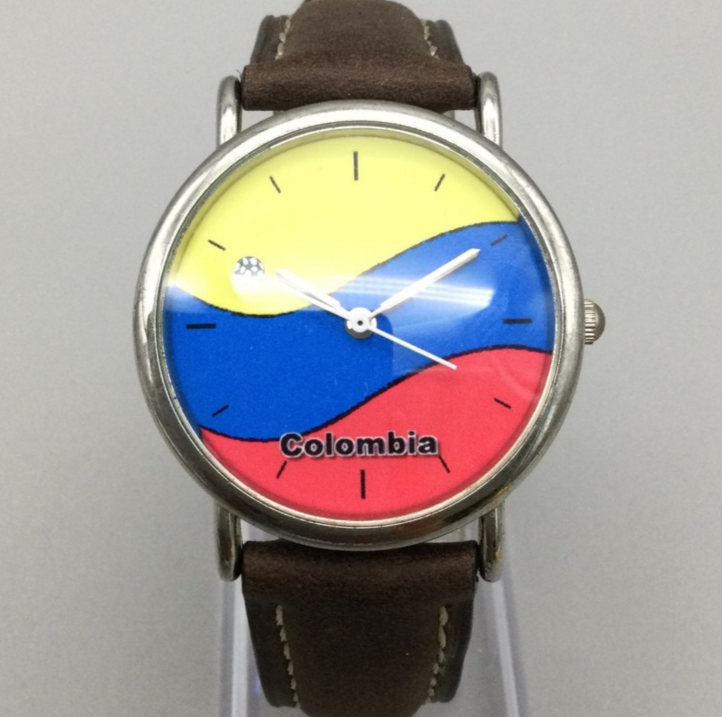 Justent Colombia Watch Women 34mm Silver Tone Yellow Blue Red Dial New Battery