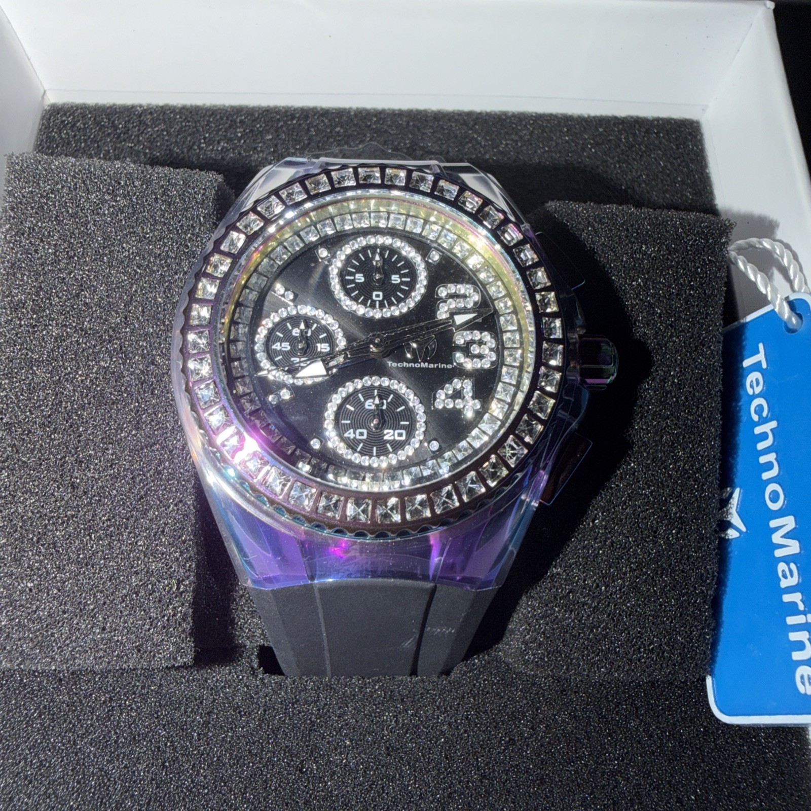 This statement timepiece features a fully iced-out case and bezel.
