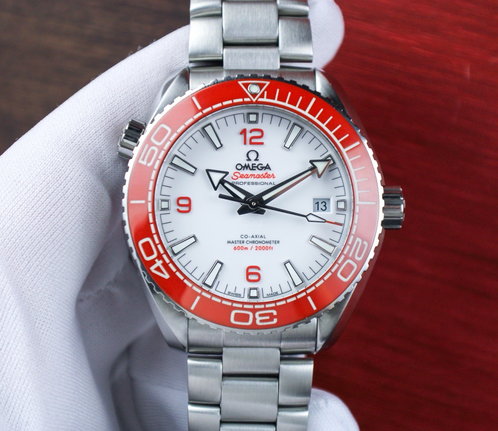Omega Seamaster Planet Ocean 600M 215.30.44.21.04.001 “Creamsicle” White Orange